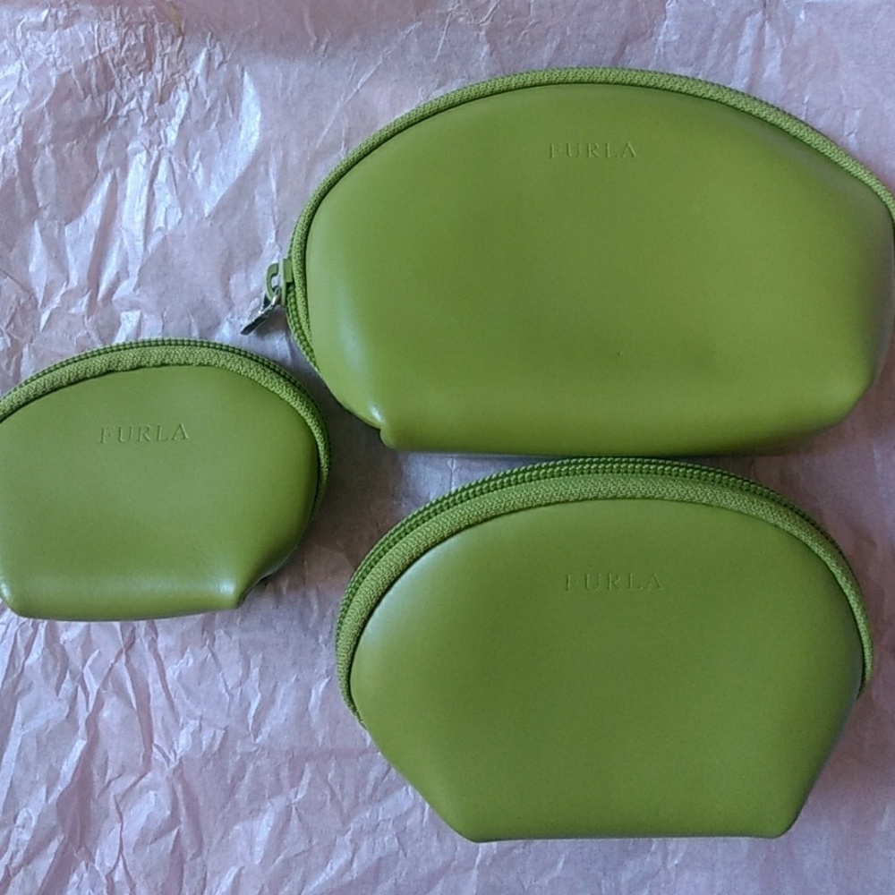 Three green nesting Furla leather pouches